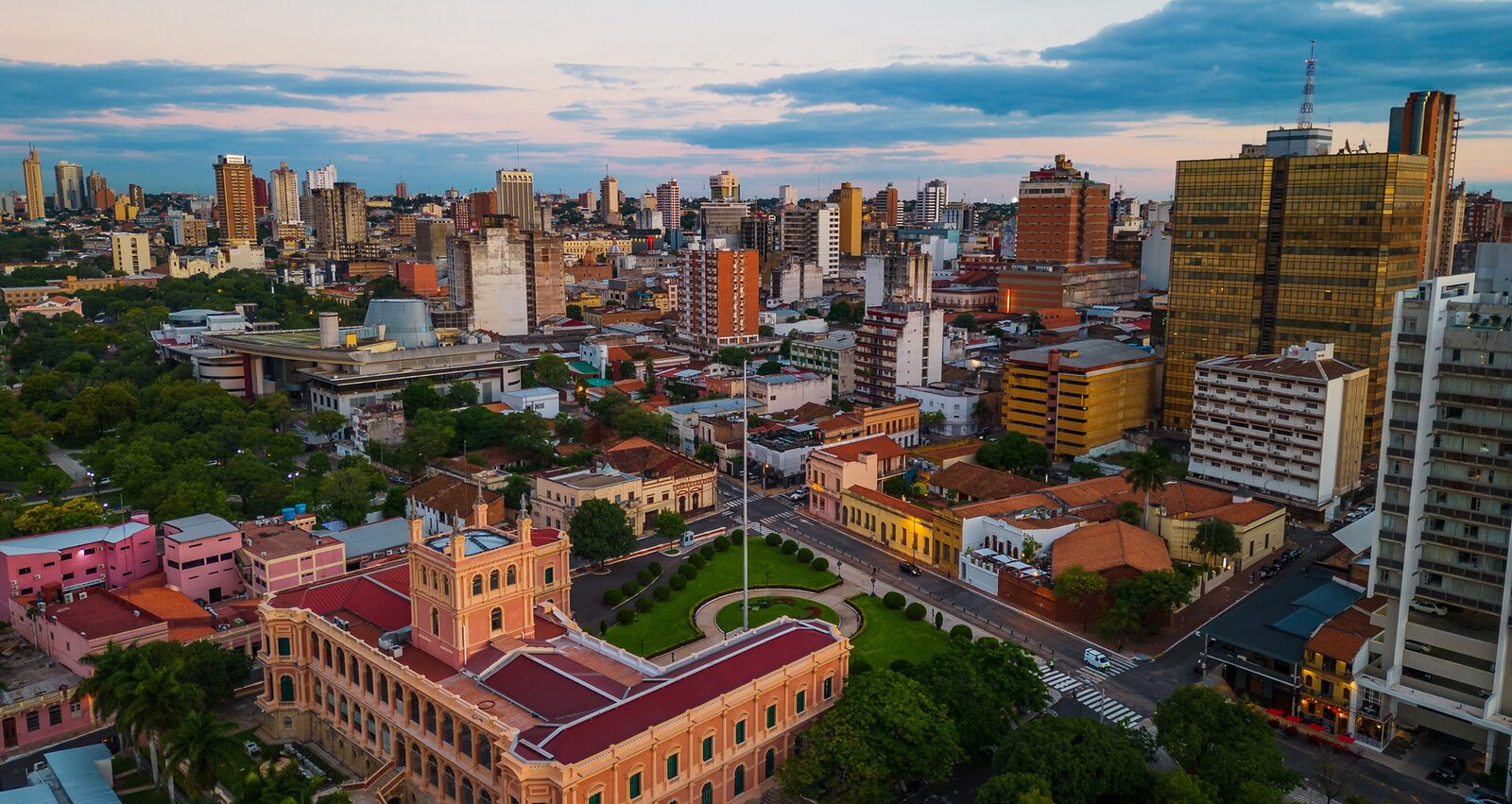 Paraguay residency application documents on a desk