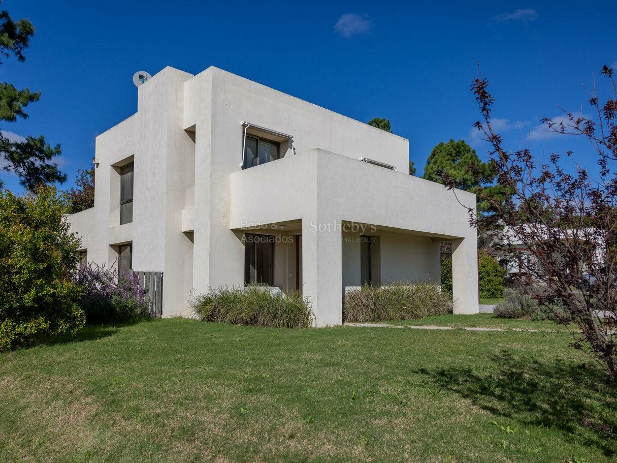 Second exterior view of the house showing the extent of the grounds