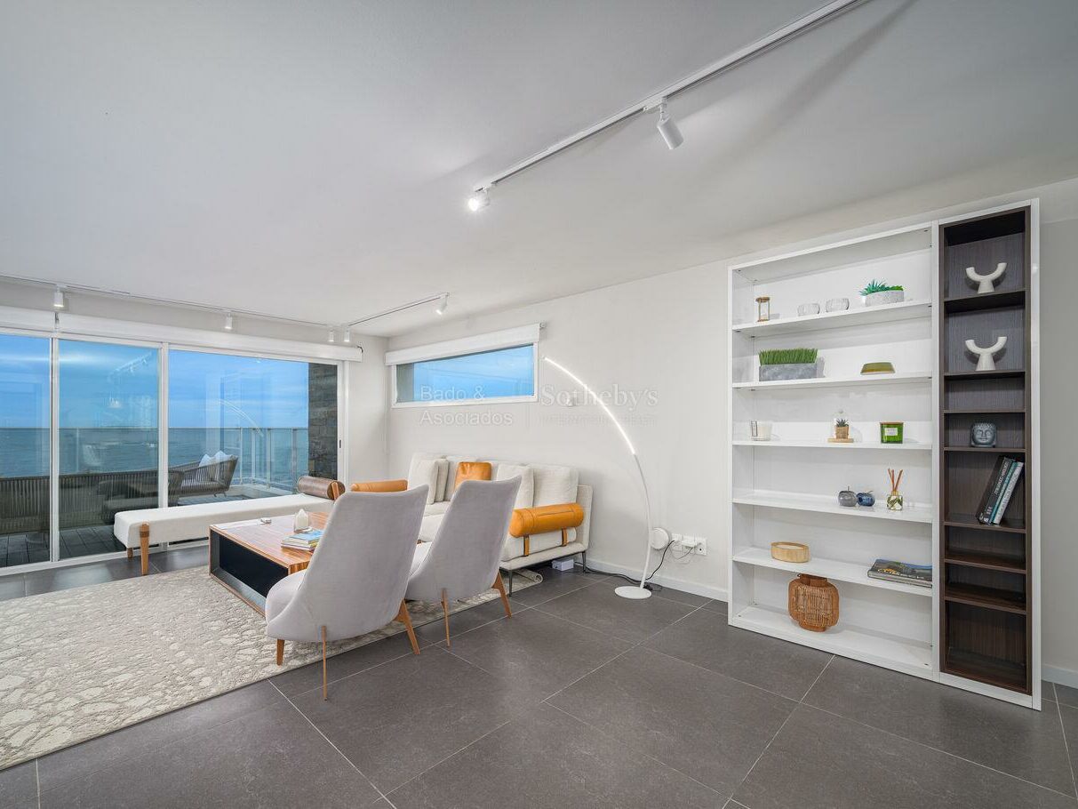 Living room of the Bonaire I penthouse opening toward the ocean