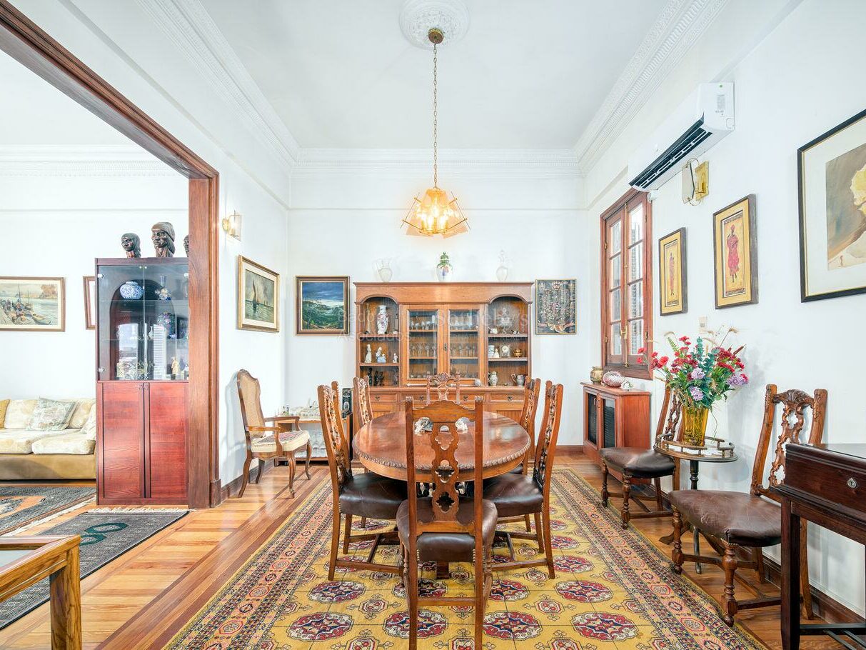 Dining room of the Palacio Montero apartment with original parquet floors