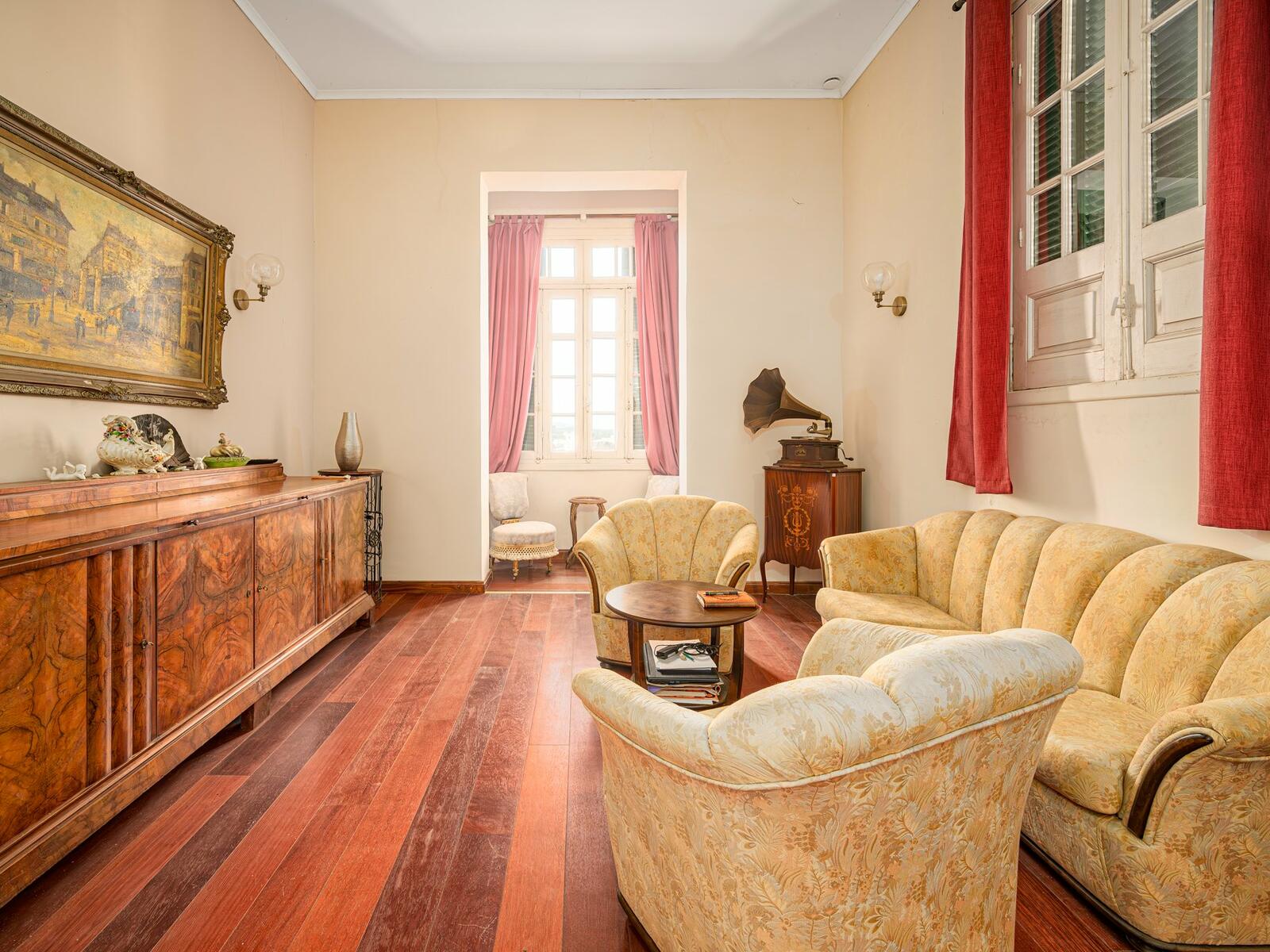 Living room with period woodwork and restored floors